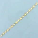 Sea Turtle And Starfish Link Bracelet In 14k Yellow Gold