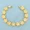 Matte Finish Flower Link Bracelet In 14k Yellow Gold