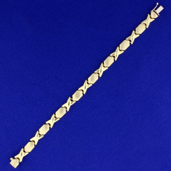 7 Inch "x" And "o" Gold Link Bracelet In 14k Yellow Gold