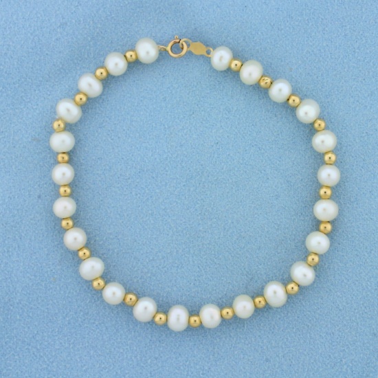 7 1/4 Inch Cultured Pearl And Gold Bead Bracelet In 14k Yellow Gold