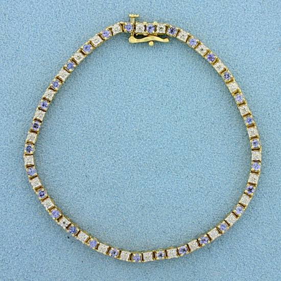 1.5ct Tw Tanzanite And Diamond Tennis Bracelet In 14k Yellow Gold