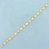 Sea Turtle And Starfish Link Bracelet In 14k Yellow Gold