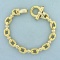 Designer Cable Link Bracelet With Ruby Clasp In 18k Yellow Gold