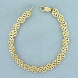 7 Inch Diamond Cut Designer Link Bracelet In 10k Yellow Gold