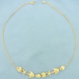 Sea Life Star Fish Sand Dollar Fish Seashell Necklace In 14k Yellow Gold