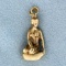 Woman Kneeling On A Rock Pendant Or Charm In 14k Yellow Gold