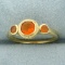 Three Stone Orange Quartz Ring In 10k Yellow Gold