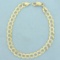 Mens 8 1/2 Inch Flat Curb Link Two-tone Chain Bracelet In 10k Yellow And White Gold