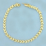 Diamond Cut Heart Link Bracelet In 14k Yellow Gold
