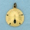 Sand Dollar Pendant Or Charm In 14k Yellow Gold