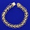 7 3/4 Inch Double Flower Design Bracelet In 14k Yellow Gold