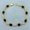 Onyx Link Bracelet In 14k Yellow Gold