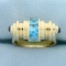 Modern Design Blue Topaz And Sapphire Ring In 14k Yellow Gold