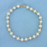 7 1/4 Inch Cultured Pearl And Gold Bead Bracelet In 14k Yellow Gold