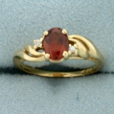 Garnet And Diamond Ring In 14k Yellow Gold