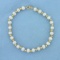 7 1/4 Inch Cultured Pearl And Gold Bead Bracelet In 14k Yellow Gold