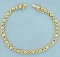 Italian Made X And O Design Bracelet In 14k Yellow Gold