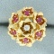 Pink Sapphire And Diamond Flower Design Ring In 14k Yellow Gold