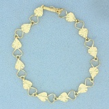 7 Inch Diamond Cut Heart Link Bracelet In 14k Yellow Gold