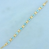 14ct Tw Swiss Blue Topaz And Diamond Line Bracelet In 14k Yellow Gold