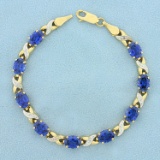 13ct Tw Lab Sapphire And Diamond Line Bracelet In 10k Yellow And White Gold