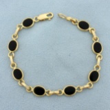 Onyx Link Bracelet In 14k Yellow Gold