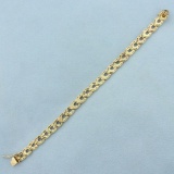 Diamond Cut Horseshoe Link Bracelet In 14k Yellow Gold
