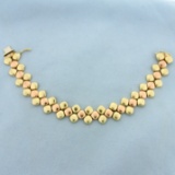 Two Tone Pebble Design Bracelet In 14k Yellow And Rose Gold