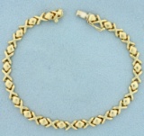 Italian Made X And O Design Bracelet In 14k Yellow Gold