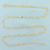 23 Inch Twisting Curb Link Chain Necklace In 21k Yellow Gold