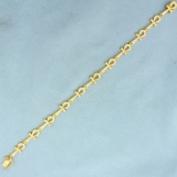 Ankh Link Bracelet In 21k Yellow Gold