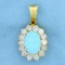 Italian Made Opal And Cz Pendant In 14k Yellow Gold