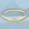 Diamond Cut Sparkle Bangle Bracelet In 10k Yellow Gold