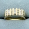 1/2ct Tw Round And Baguette Diamond Channel Set Wedding Or Anniversary Ring In 14k Yellow Gold