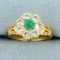 1ct Tw Emerald And White Sapphire Flower Design Ring In 18k Yellow Gold