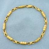 Designer Infinity Design Link Bracelet In 18k Yellow Gold