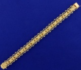 Designer Woven Style Charm Bracelet In 14k Yellow Gold