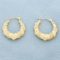 Diamond Cut Heart Hoop Earrings In 14k Yellow Gold