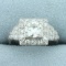 Vintage 1.5ct Tw Halo Diamond Engagement Ring In Platinum