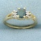 Green Topaz And Diamond Ring In 10k Yellow Gold