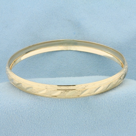 Diamond Cut Sparkle Bangle Bracelet In 10k Yellow Gold