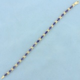 8.5ct Tw Tanzanite Flower Design Line Bracelet In 14k Yellow Gold