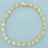 8 Inch Designer 3d Link Diamond Cut Bracelet In 10k Yellow Gold