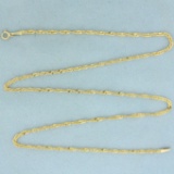 18 Inch Twisting Curb Link Chain Necklace In 14k Yellow Gold