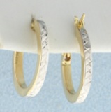 Diamond Cut Two Tone Hoop Earrings In 14k Yellow And White Gold