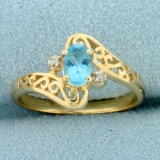 Swiss Blue Topaz And Diamond Ring In 14k Yellow Gold