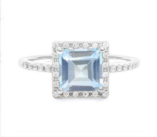 Large 2.1ct Sky Blue Topaz Halo Ring In Sterling Silver