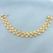 Two Tone Pebble Design Bracelet In 14k Yellow And Rose Gold