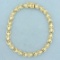 6 1/2 Inch Heart Link Diamond Cut Bracelet In 14k Yellow Gold