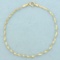Twisting Herringbone Link Chain Bracelet In 14k Yellow Gold